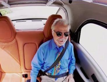 Google Car test "driver" enjoys the ride. Image: Google Blog.
