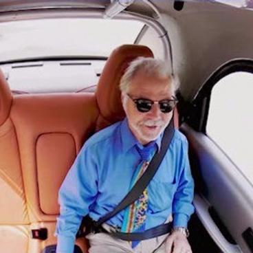 Google Car test "driver" enjoys the ride. Image: Google Blog.